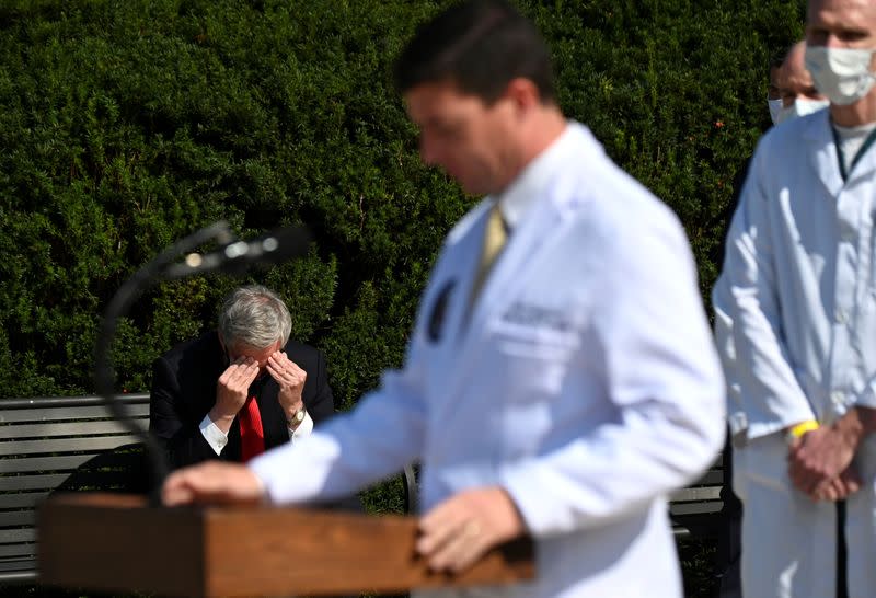 White House Chief of Staff Mark Meadows gestures as U.S. Navy Commander Dr. Sean Conley speaks about U.S. President Donald Trump's health, in Bethesda