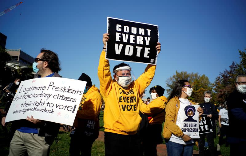 People take part in a rally demanding a fair count of the votes of the 2020 U.S. presidential election, in Philadelphia