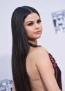 <p>Selena's hair is sooo long here! If you're hoping to achieve the same look, check out these <a href="https://www.seventeen.com/beauty/hair/advice/a29230/how-to-get-long-hair-fast/" rel="nofollow noopener" target="_blank" data-ylk="slk:10 hacks for making your hair grow faster.;elm:context_link;itc:0;sec:content-canvas" class="link ">10 hacks for making your hair grow faster.</a> </p>
