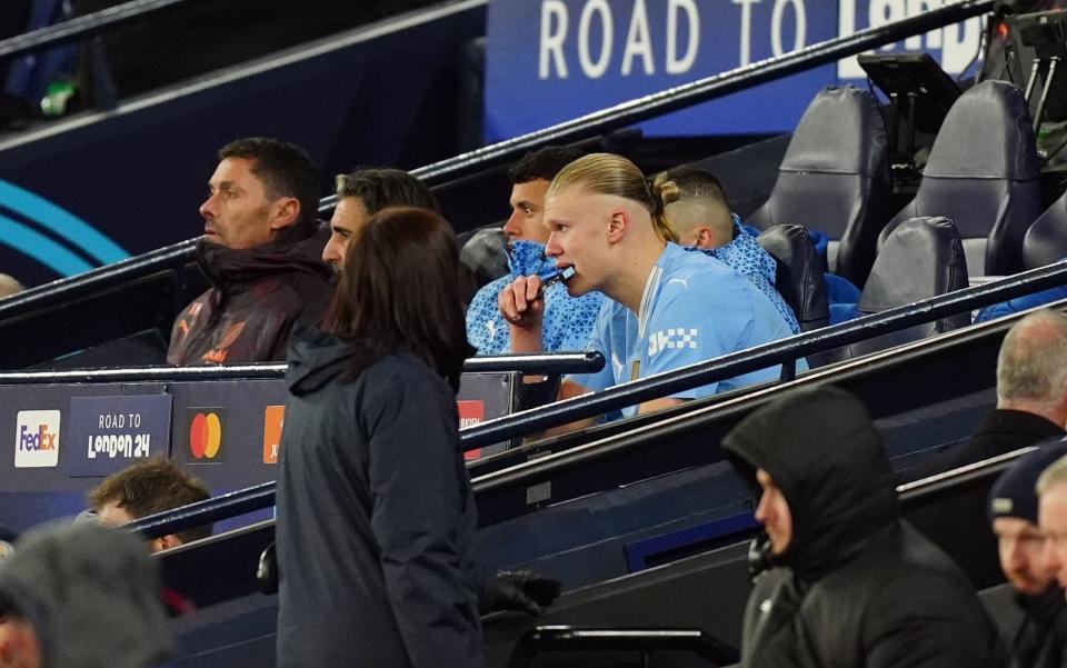 Erling Haaland sat on the bench after being taken off