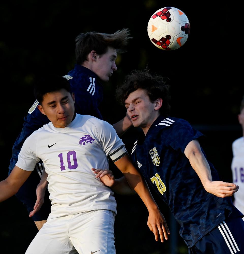 Independence's Connor Albright (20) heads the ball away from Columbia Central's Victor Ramirez (10) during an high school soccer game on Tuesday, April 26, 2022, in Thompson’s Station, Tenn.  