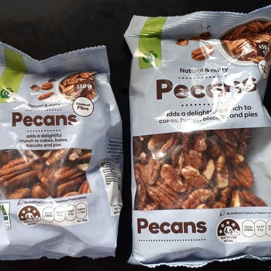 Picture of the two packs of Woolworths-brand pecans.