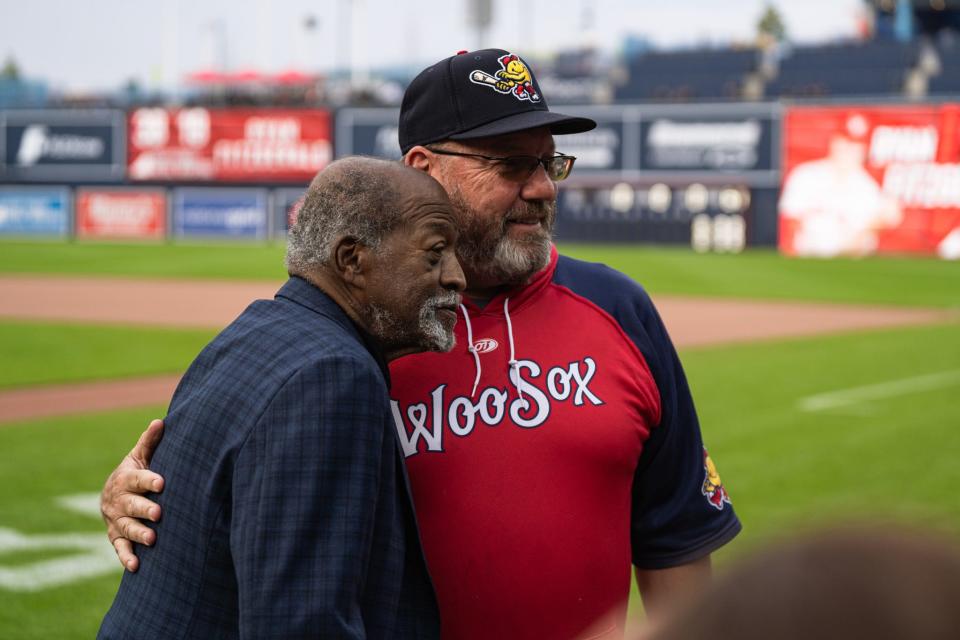 Worcester Red Sox hitting coach Rich Gedman, right, poses with another former Red Sox legend Luis Tiant prior to a game in 2023.