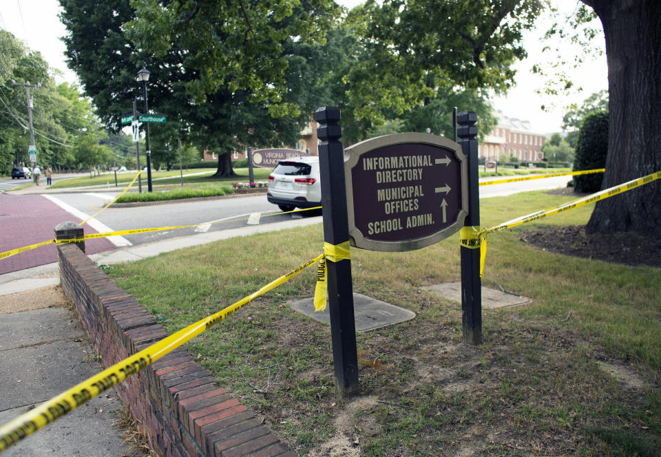 Police work the scene where eleven people were killed during a mass shooting at the Virginia Beach city public works building, May 31, 2019 in Virginia Beach, Va.  (Photo: L. Todd Spencer/The Virginian-Pilot via AP)