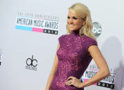 Carrie Underwood arrives at the 40th Anniversary American Music Awards on Sunday, Nov. 18, 2012, in Los Angeles. (Photo by Jordan Strauss/Invision/AP)