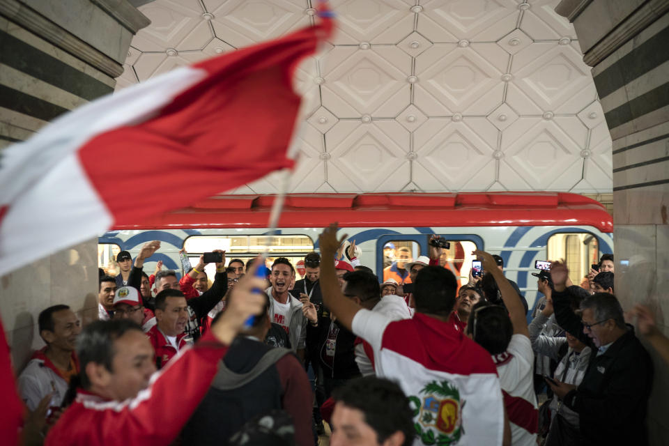 <p>Buoyant atmosphere: Fans gather near the Luzhniki metro station, close to the stadium, a few hours before kick off. (AP Photo/Felipe Dana) </p>