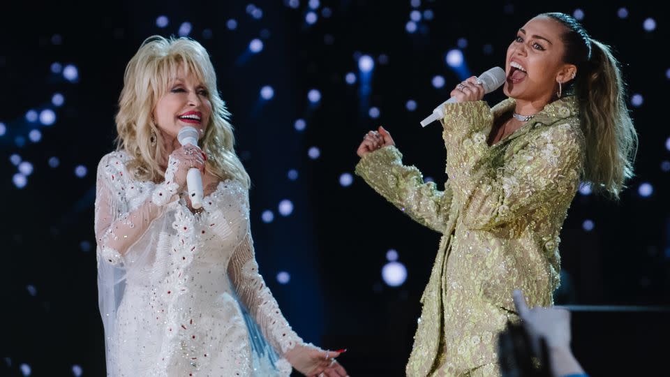 Dolly Parton and Miley Cyrus perform onstage at the 61st annual Grammy Awards at Staples Center on February 10, 2019 in Los Angeles, California. They have a new duet of Cyrus' "Wrecking Ball" on Parton's new album. - Emma McIntyre/Getty Images for The Recording Academy