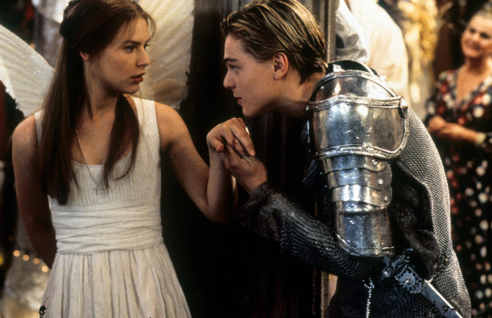 Claire Danes is surprised as Leonardo DiCaprio takes her hand to kiss in scene from the film ‘Romeo + Juliet’, 1996. (Photo by 20th Century-Fox/Getty Images)