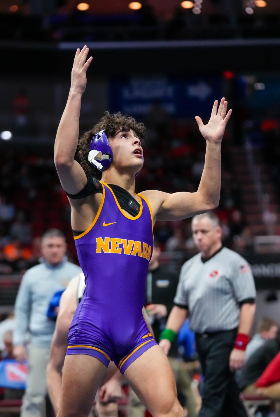 Nevada’s Kaden Weber celebrates his win over Humboldt’s Cyler Cirks at 113 pounds during the quarterfinals of the Class 2A state wrestling meet on Thursday.