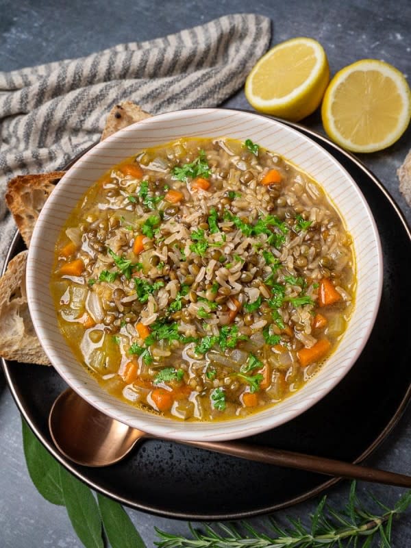 <p>Skinny Spatula</p><p>This brown rice and lentil soup is loaded with flavors and packed with protein and fiber. It’s also naturally vegan, super delicious and feels like proper comfort food!</p><p><strong>Get the recipe: <a href="https://skinnyspatula.com/rice-lentil-soup/" rel="nofollow noopener" target="_blank" data-ylk="slk:Vegan Brown Rice and Lentil Soup;elm:context_link;itc:0;sec:content-canvas" class="link ">Vegan Brown Rice and Lentil Soup</a></strong></p>