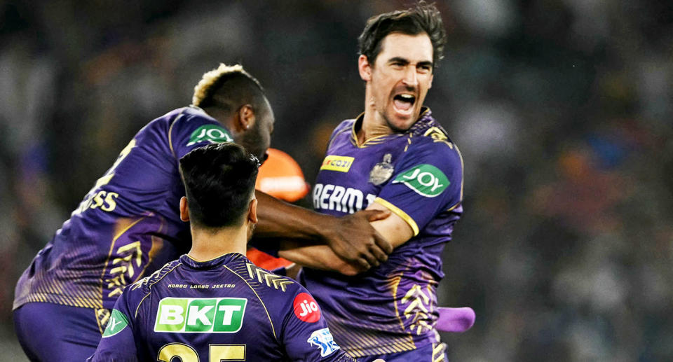 Seen here, Mitchell Starc celebrates with KKR teammates during the IPL finals victory over Sunrisers Hyderabad. 