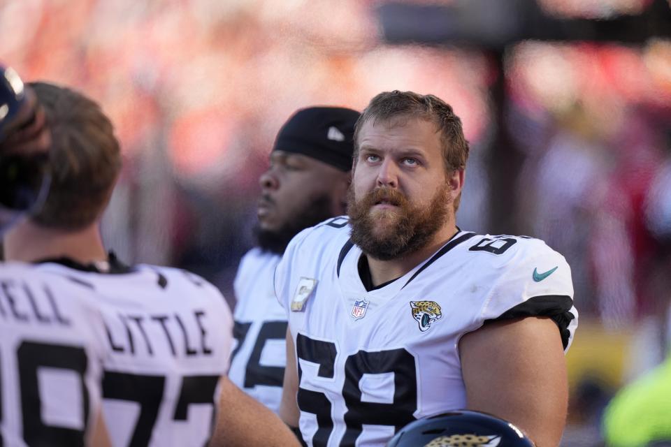 Jacksonville Jaguars guard Brandon Scherff is seen on the bench during the second half of an NFL football game against the Kansas City Chiefs Sunday, Nov. 13, 2022, in Kansas City, Mo. (AP Photo/Charlie Riedel)