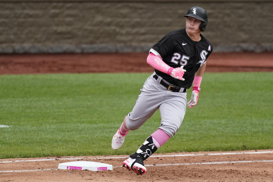 Chicago White Sox's Andrew Vaughn runs to second after hitting a double during the sixth inning of a baseball game against the Kansas City Royals Sunday, May 9, 2021, in Kansas City, Mo. (AP Photo/Charlie Riedel)