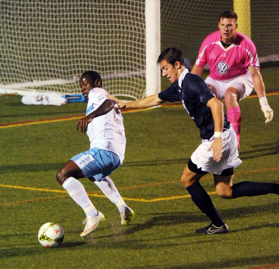 Former Wilmington Hammerhead Christian Bassogog looks or an opening against Chattanooga in 2015.