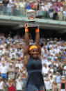 FILE - Serena Williams, of the U.S., lifts the cup after defeating Russia's Maria Sharapova after the women's final match of the French Open tennis tournament at toland Garros stadium Saturday, June 8, 2013 in Paris. Williams won 6-4, 6-4. Saying “the countdown has begun,” 23-time Grand Slam champion Serena Williams announced Tuesday, Aug. 9, 2022, she is ready to step away from tennis so she can turn her focus to having another child and her business interests, presaging the end of a career that transcended sports. (AP Photo/Michel Euler, File)