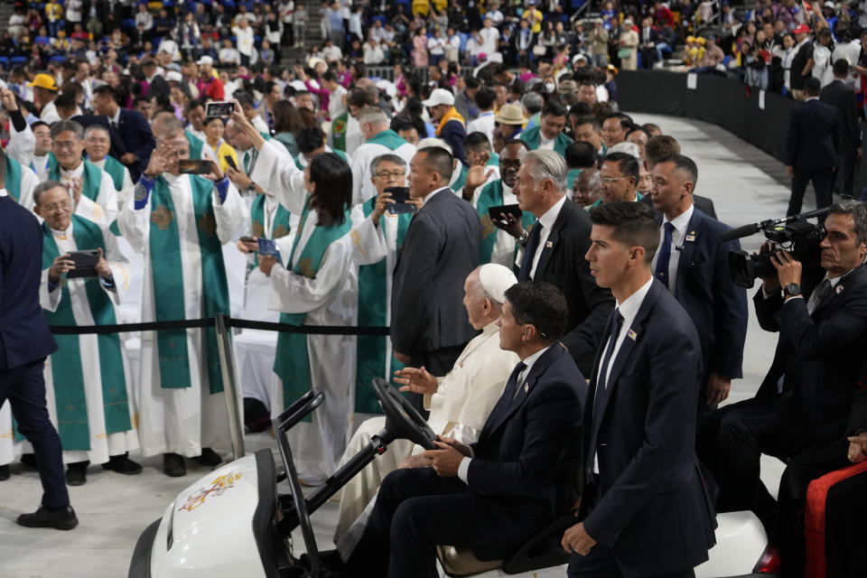 Pope Francis arrives to preside over a mass at the Steppe Arena in the Mongolian capital Ulaanbaatar, Sunday, Sept. 3, 2023. Francis is in Mongolia to minister to one of the world's smallest and newest Catholic communities. Neighboring China's crackdown on religious minorities has been a constant backdrop to the trip, even as the Vatican hopes to focus attention instead on Mongolia and its 1,450 Catholics. (AP Photo/Andrew Medichini)