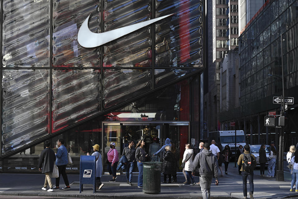 People walk past the Nike Store on Fifth Avenue in midtown Manhattan in New York. - Credit: NDZ/STAR MAX/IPx