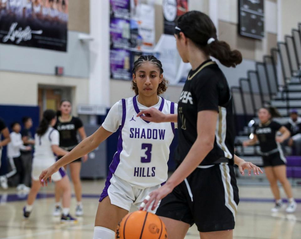 Shadow Hills' Victoria Hyatt (3) guards Xavier Prep's Amoree Ferrel (11) during the fourth period of their game at Shadow Hills High School in Indio, Calif., Tuesday, Jan. 9, 2024.
