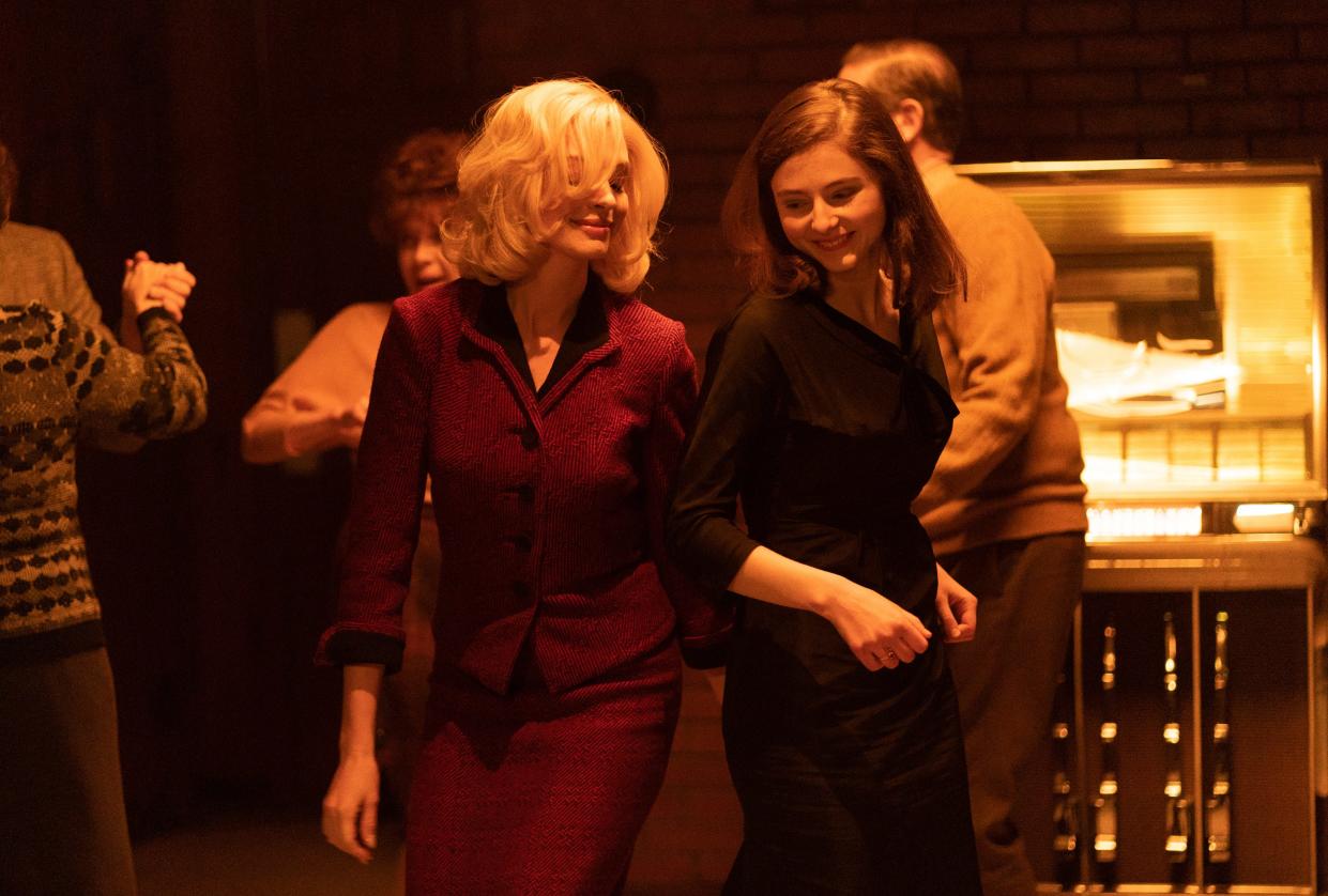 Anne Hathaway and Thomasin McKenzie in "Eileen."