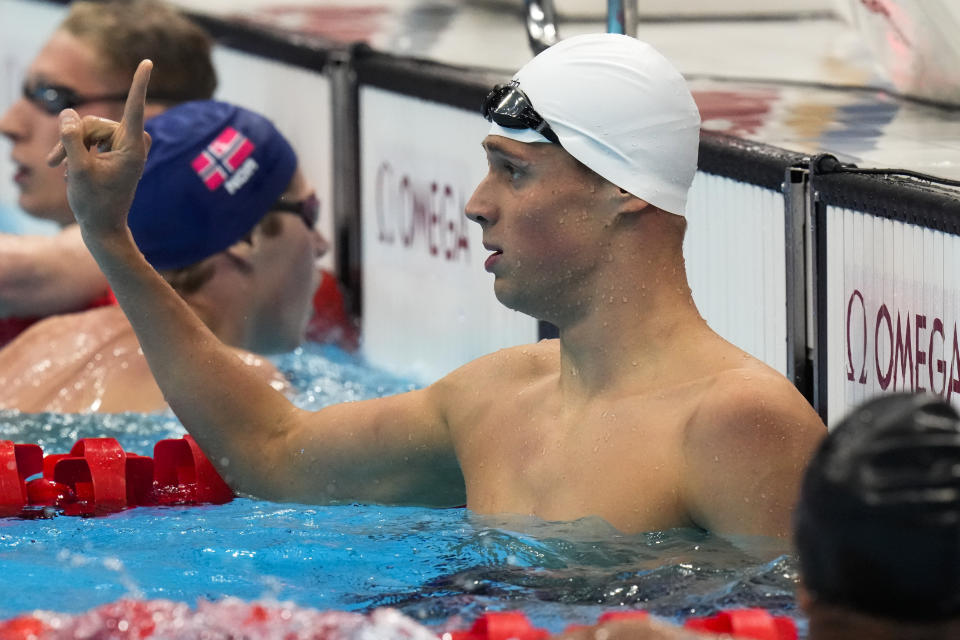 Mykhailo Romanchuk, of Ukraine, celebrates after winning a heat of the men's 800-meter freestyle at the 2020 Summer Olympics, Tuesday, July 27, 2021, in Tokyo, Japan. (AP Photo/Petr David Josek)