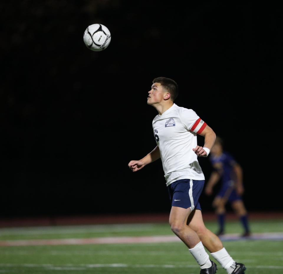 Beacon's Avery Davis headers the ball during the Section 9 Class A championship.