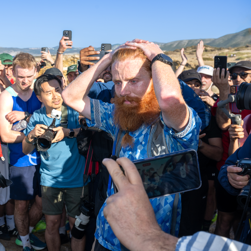 Russ Cook crossing the finish line at Ras Angela, the northernmost point in Tunisia (The Snapshot People Ltd/PA)