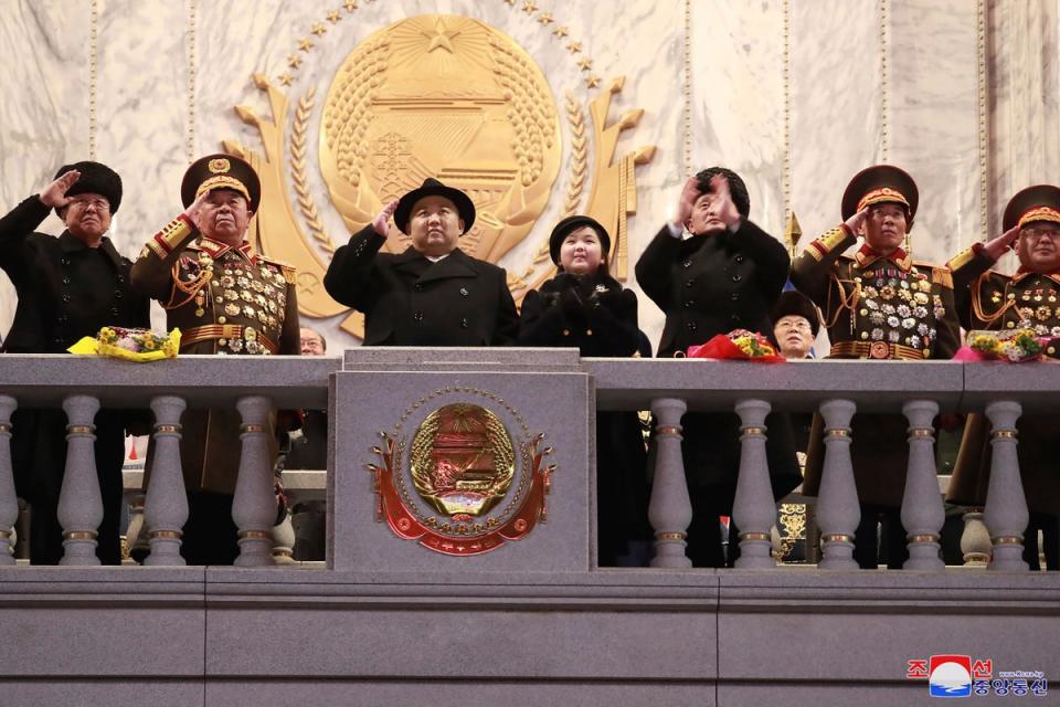 North Korean leader Kim Jong Un, third left, and his daughter attend a military parade to mark the 75th founding anniversary of the Korean People’s Army (AP)