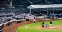 <p>The New York Mets have cardboard cutouts of fans in the seats while playing the New York Yankees in a pre-season exhibition game at Citi Field in New York on July 18.</p>