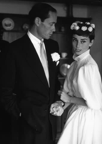 <p>Ernst Haas/Ernst Haas/Getty</p> Audrey Hepburn and Mel Ferrer on their wedding day on September 25, 1954.