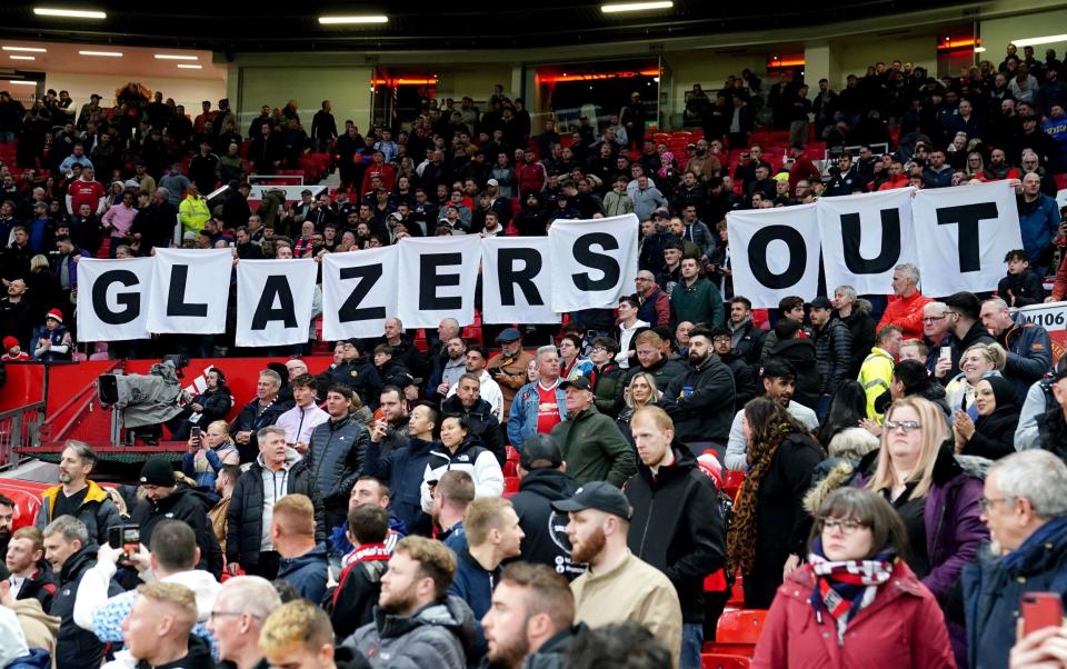 Manchester United fans protest against the Glazer family, ahead of the Premier League match at Old Trafford, Manchester - Richard Arnold urges Manchester United fans to stop anti-Glazer protests and back Erik ten Hag - PA