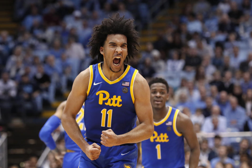 Pittsburgh guard Justin Champagnie (11) reacts following a basket against North Carolina during the second half of an NCAA college basketball game in Chapel Hill, N.C., Wednesday, Jan. 8, 2020. (AP Photo/Gerry Broome)