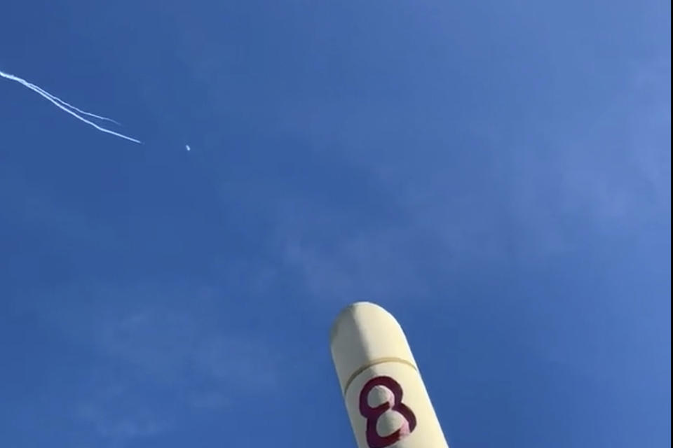 This photo provided by Jason Sellers shows U.S. Air Force fighter aircraft shooting down a suspected Chinese spy balloon off the Carolina coast on Saturday, Feb. 4, 2023. President Joe Biden said on Saturday that he ordered U.S. officials to shoot down the suspected Chinese spy balloon earlier this week and that national security leaders decided the best time for the operation was when it got over water. (Jason Sellers via AP)