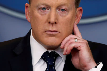 FILE PHOTO: White House Press Secretary Sean Spicer listens to a reporter's question during his daily briefing at the White House in Washington, U.S., June 20, 2017. REUTERS/Jonathan Ernst/File Photo