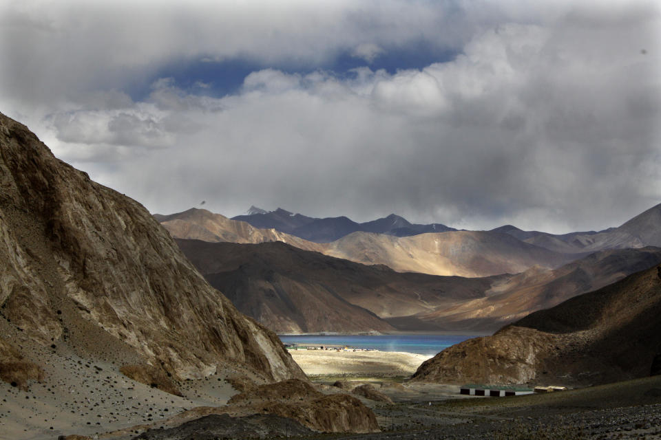 FILE-In this Sept. 14, 2017, file photo, Pangong Tso lake is seen near the India China border in India's Ladakh area. India said Monday its soldiers thwarted China's "provocative" military movements near a disputed border in Ladakh region amid a monthslong standoff. (AP Photo/Manish Swarup, file)