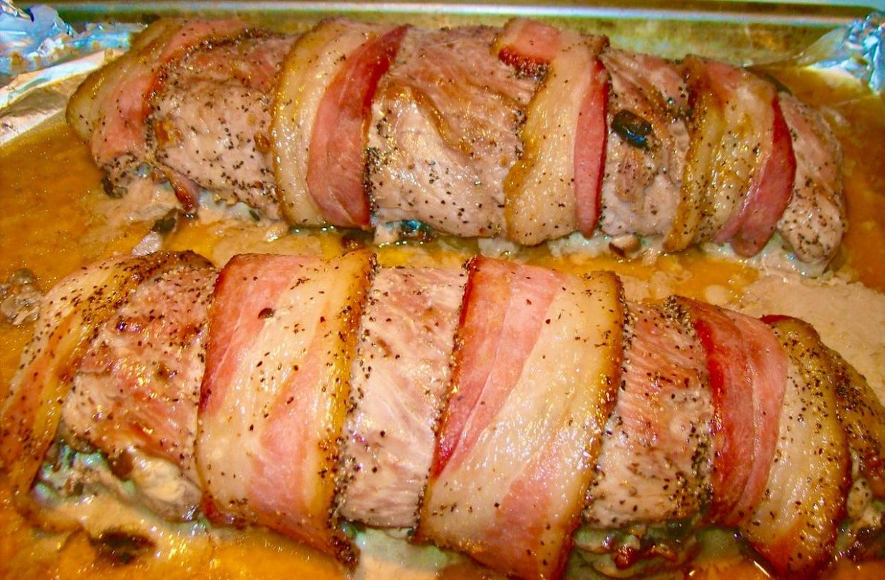 Peppered bacon wrapped pork tenderloin with savory mushroom pecan stuffing