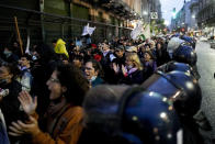 Demonstrators protest layoffs of state workers and other policies of President Javier Milei outside Congress in Buenos Aires, Argentina, Friday, April 12, 2024. Milei's government has cut 15,000 state jobs over the past three months. (AP Photo/Natacha Pisarenko)
