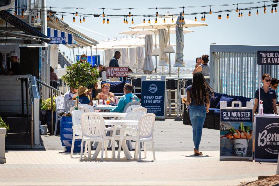 Benny's on the Beach at Lake Worth Beach Park in Lake Worth Beach is open for business after being closed due to the coronavirus pandemic, Tuesday, May 12, 2020. Every other table is open to keep in line with social distancing protocols.