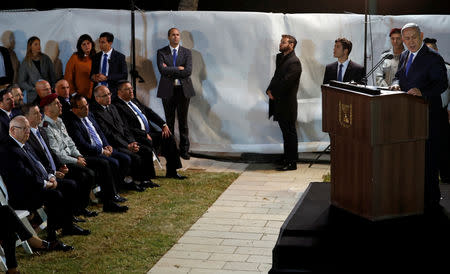 Israeli Prime Minister Benjamin Netanyahu speaks during the funeral of Zachary Baumel, a U.S.-born Israeli soldier missing since a 1982 tank battle against Syrian forces and whose remains were recently recovered by Israel, at the Mount Herzl military cemetery in Jerusalem April 4, 2019. REUTERS/Ronen Zvulun