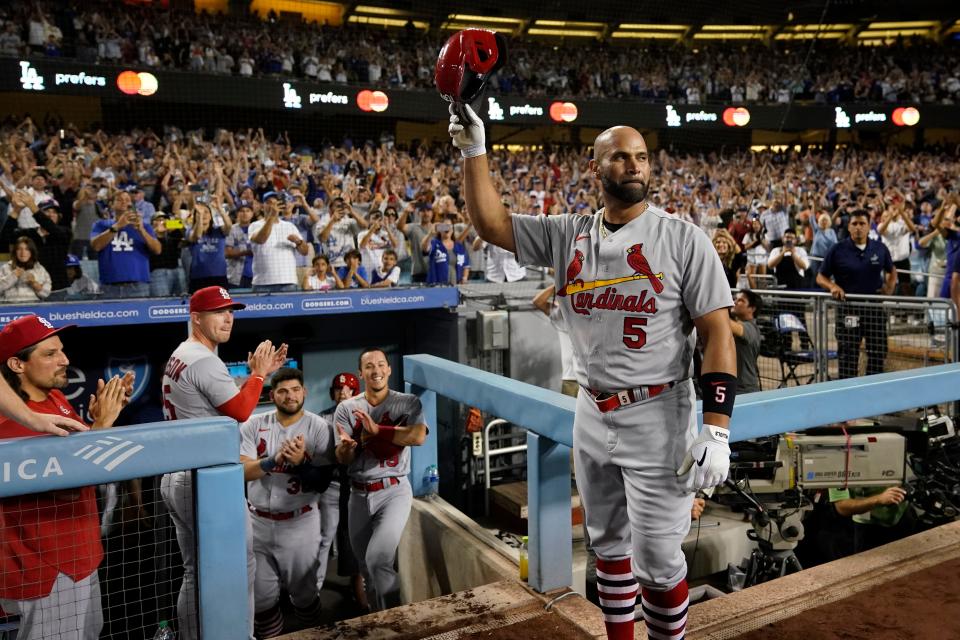 St. Louis Cardinals designated hitter Albert Pujols (5) celebrates after hitting his 700th career home run, on Friday, Sept. 23, 2022, against the Los Angeles Dodgers in Los Angeles. Pujols is just the fourth player to join MLB's 700-homer club.