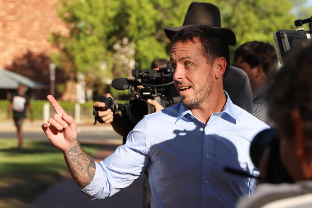 <span>Zachary Rolfe leaving the inquest into the death of Kumanjayi Walker at the Alice Springs local court on Monday. His lawyer has called for arrests over alleged threats made at the time.</span><span>Photograph: Rudi Maxwell/AAP</span>