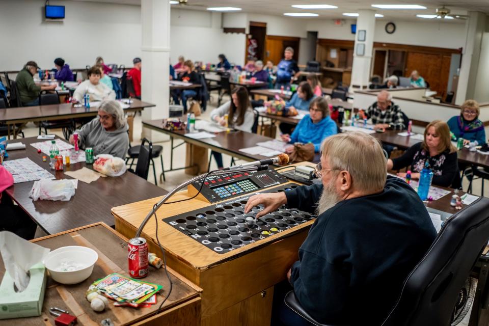 Dan Kohtala, of Ishpeming, serves as caller during bingo night at the Odd Fellows building in Ishpeming on Friday, Feb. 10, 2023, in Michigan's Upper Peninsula.