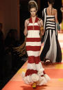 <b>Jean Paul Gaultier SS13 </b><br><br>Jean Paul Gaultier continued to use block stripes in his couture designs.<br><br>© Rex