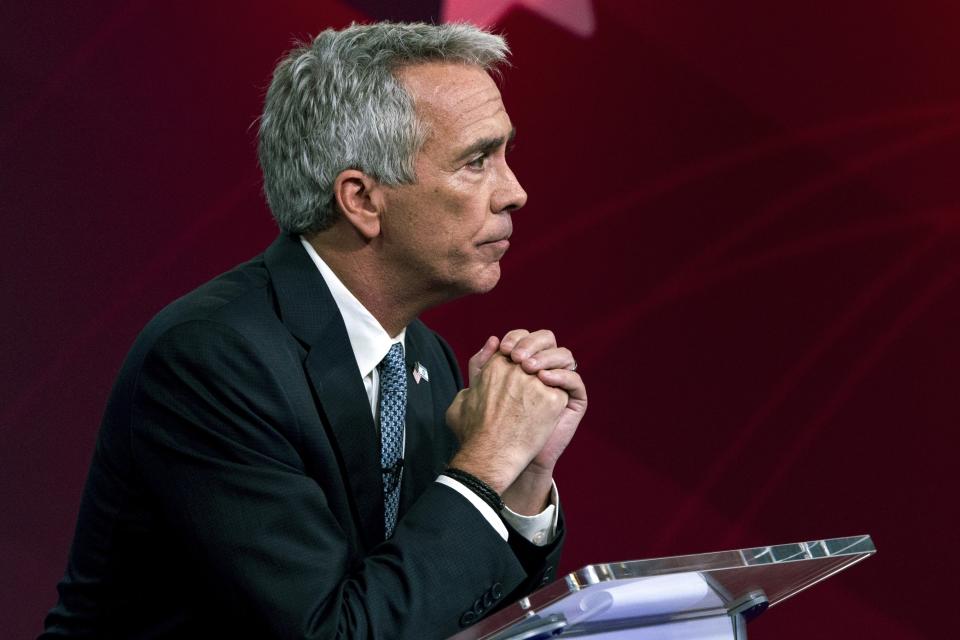 FILE - In this Sept. 24, 2019, file photo, Republican presidential candidate and former Rep. Joe Walsh, R-Ill., listens to a question during a debate in New York. Walsh said Friday, Feb. 7, 2020, he is suspending his campaign. (AP Photo/Julius Constantine Motal, File)