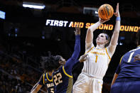 Tennessee's Sara Puckett (1) shoots over Toledo's Khera Goss (22) in the second half of a second-round college basketball game in the NCAA Tournament, Monday, March 20, 2023, in Knoxville, Tenn. (AP Photo/Wade Payne)