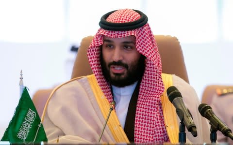 A handout picture provided by the Saudi Royal Palace on November 26, 2017, shows Saudi Crown Prince and Defence Minister Mohammed bin Salman speaking at the meeting of defence ministers of the 41-member Saudi-led anti-terror force in the capital Riyadh - Credit:  BANDAR AL-JALOUD/ AFP