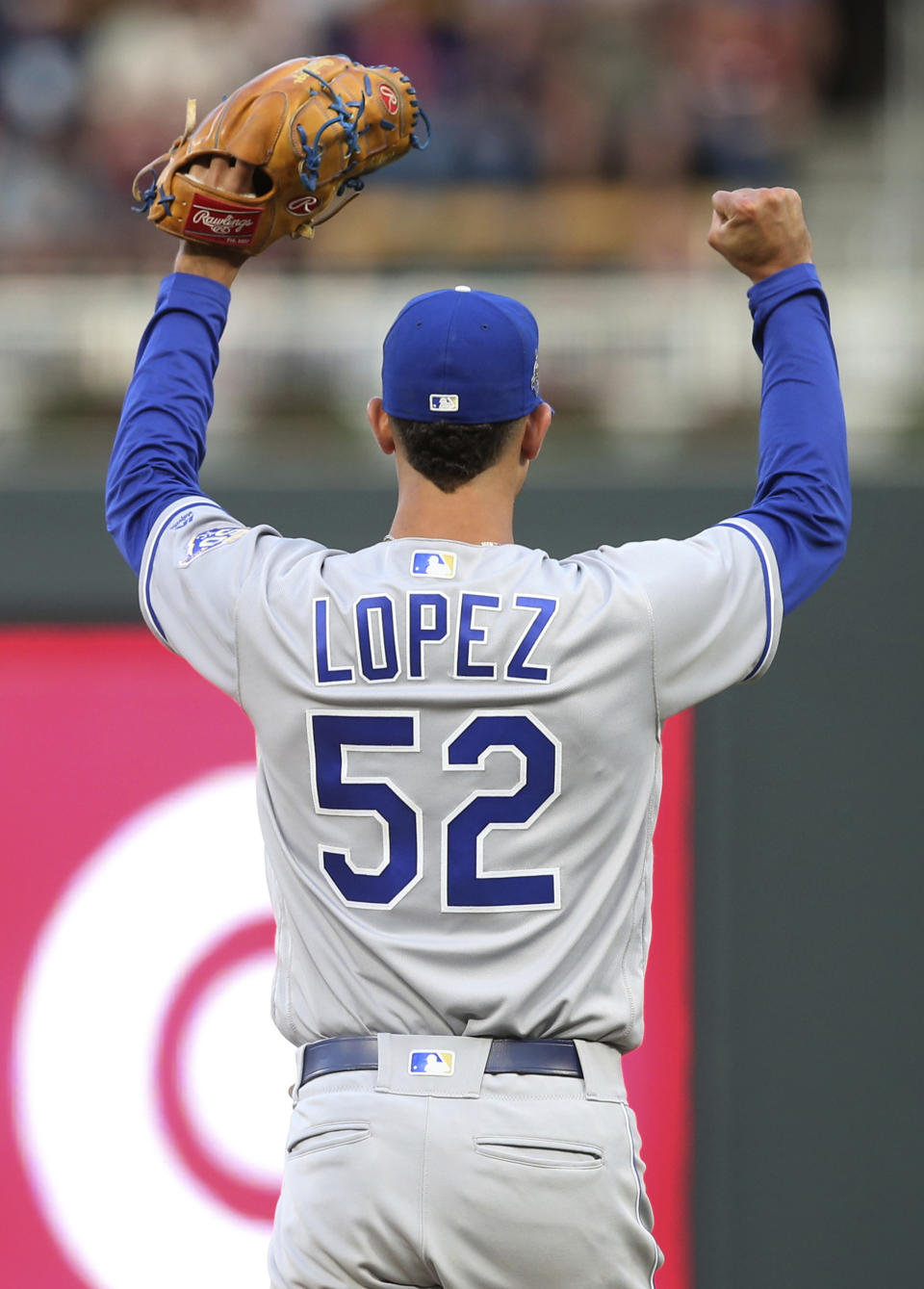 Kansas City Royals pitcher Jorge Lopez celebrates a catch by right fielder Jorge Bonifacio on a liner by Minnesota Twins' Jorge Polanco during the fourth inning of a baseball game Saturday, Sept. 8, 2018, in Minneapolis. (AP Photo/Jim Mone)