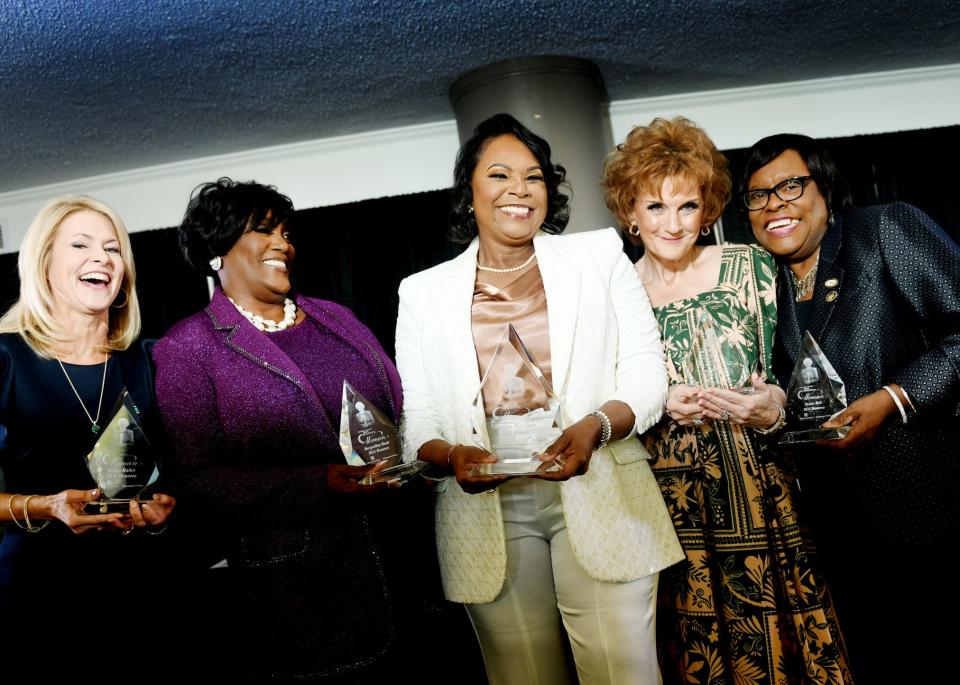 Katrina D. Worsham (center) is the Holy Angels Virginia K. Shehee Most Influential Woman Award winner and is surounded by other honorees (left to right) Sonja Bailes, Jacqueline A. Scott, Robin Giecek Merkle and Dottie Howard Bell during the eighth annual luncheon at East Ridge Country Club Thursday, March 7, 2024.