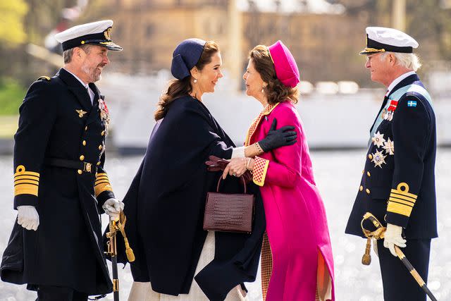 <p>Ida Marie Odgaard/Ritzau Scanpix/AFP/Getty</p> (From left) King Frederik, Queen Mary, Queen Silvia and King Carl XVI Gustaf at the start of the state visit on May 6, 2024 in Stockholm, Sweden.