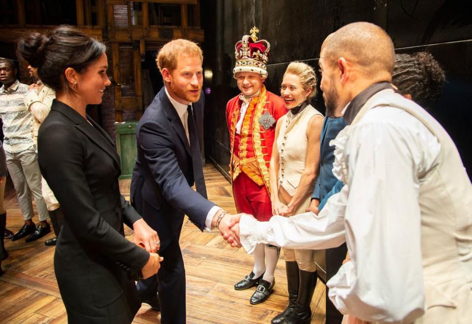 Prince Harry and Meghan Markle with the cast of <em>Hamilton </em>