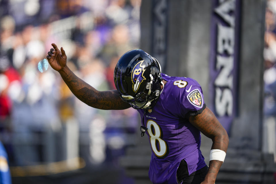 Baltimore Ravens quarterback Lamar Jackson (8) runs on the field before an NFL football game against the Minnesota Vikings, Sunday, Nov. 7, 2021, in Baltimore. (AP Photo/Nick Wass)